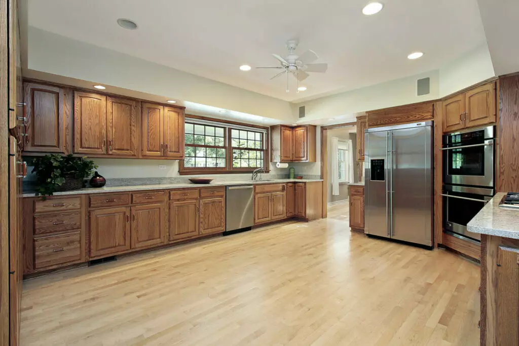 Professional kitchen cleaning service in Boston ensuring a spotless and sanitized kitchen floor; How to Clean Kitchen Floor