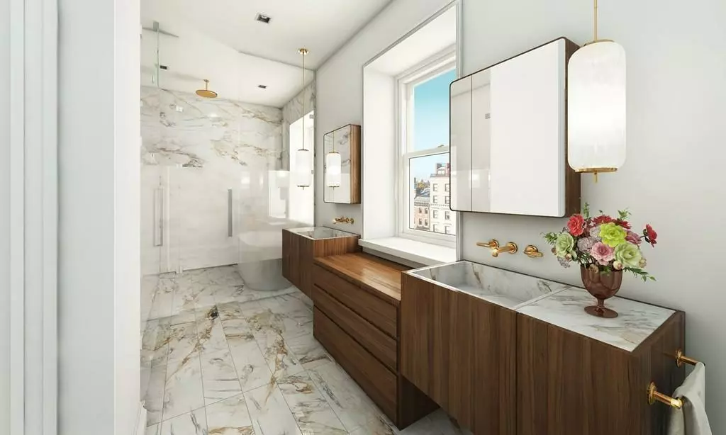 Modern bathroom with marble floor and walls, floating wooden vanities with vessel sinks, mirrored cabinets, pendant lights, and a large window offering a city view.