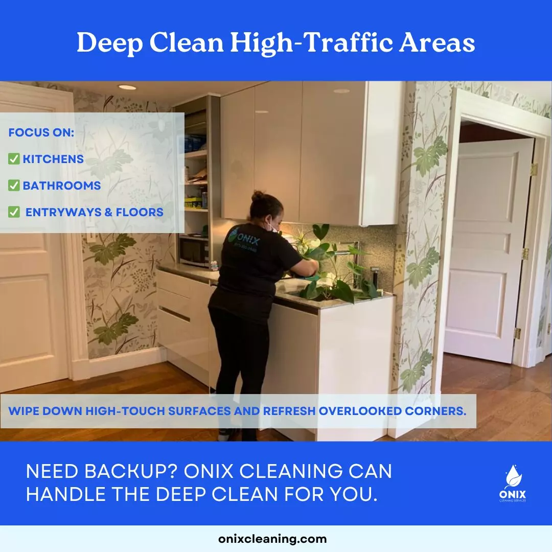 A cleaning professional wipes a kitchen countertop in a well-lit home, emphasizing deep cleaning of high-traffic areas like kitchens, bathrooms, and entryways—perfect for thorough End-of-School-Year Cleaning.